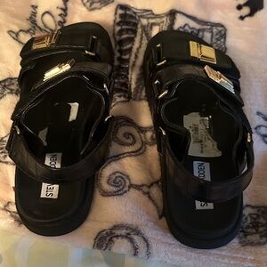 Steve Madden Black Sandals with Gold Accents